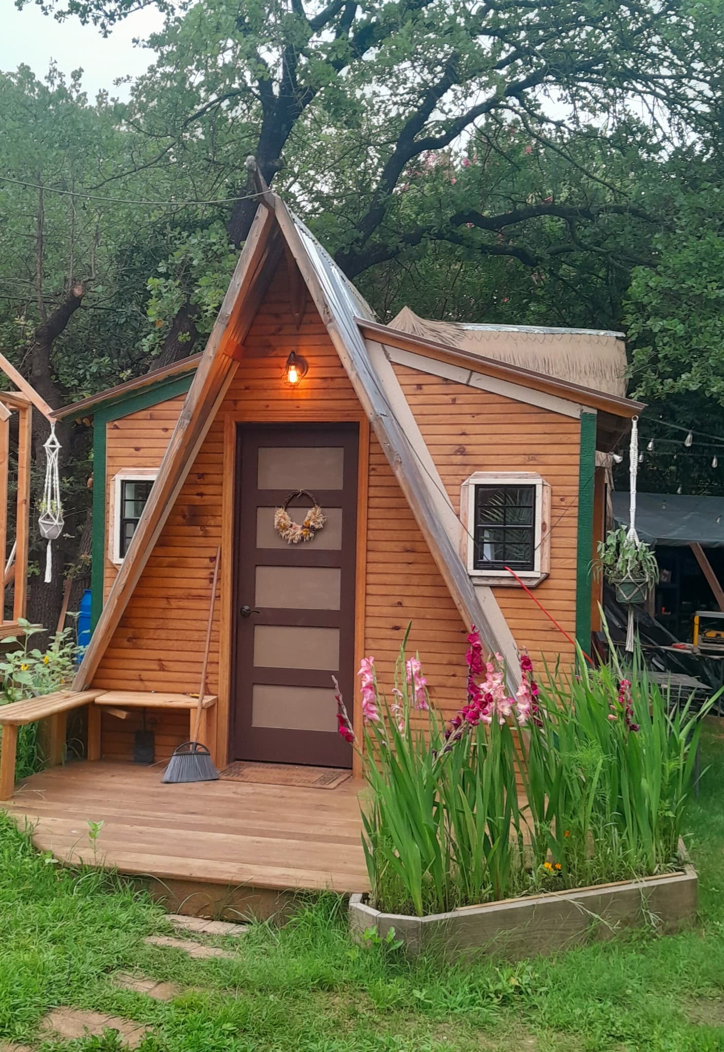 The finished cedar A-frame tiny house